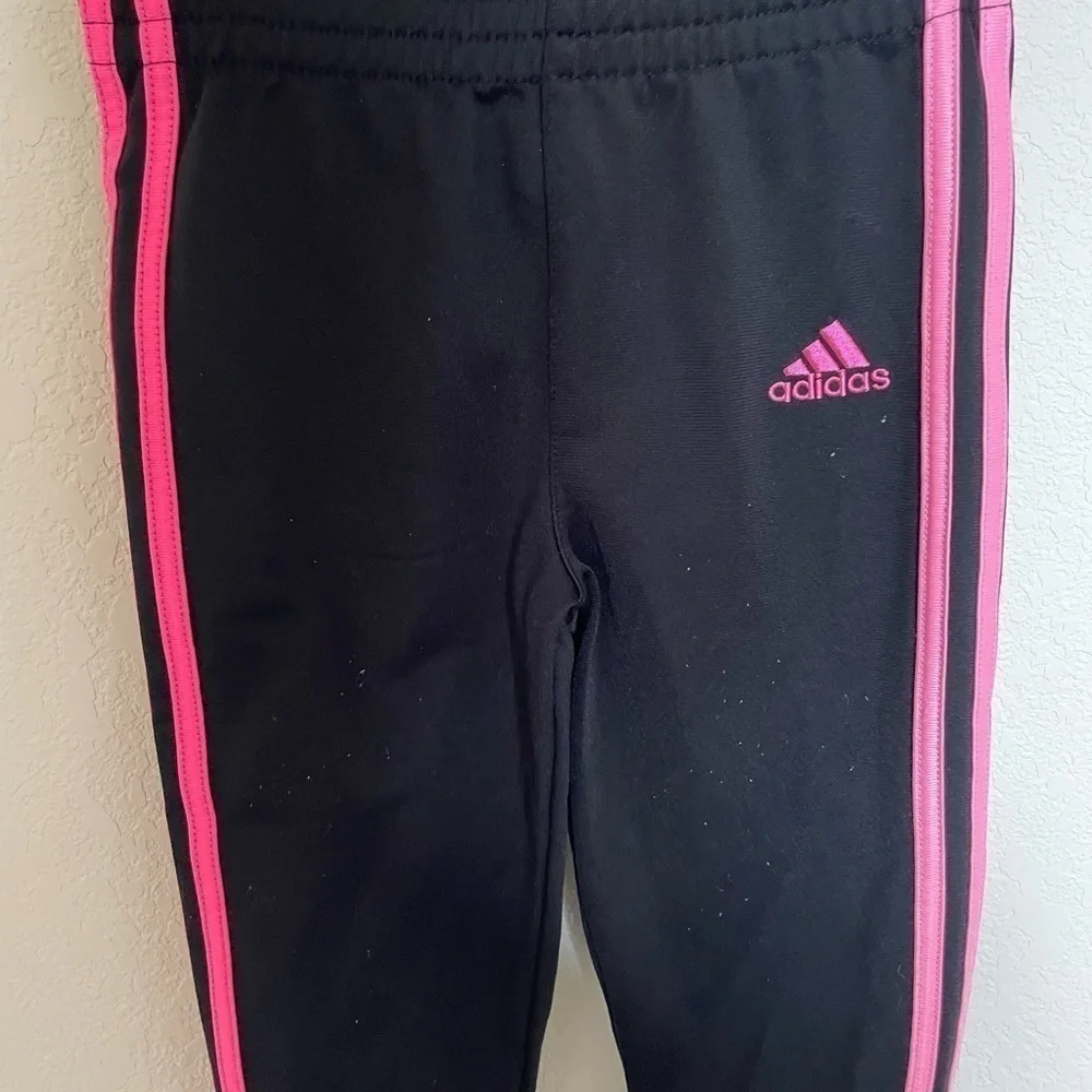 Adidas two-piece children’s 18 months pink and black tracksuit